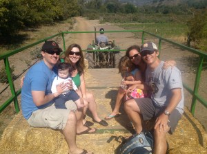 On a hayride at Avila Farm with cousins Jacquie, Devin and baby Gavin.