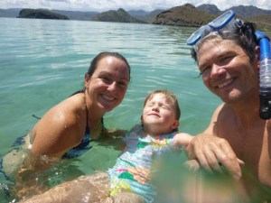 Taking a swim in the crystal clear waters of Playa Santispac in Bahia Concepcion
